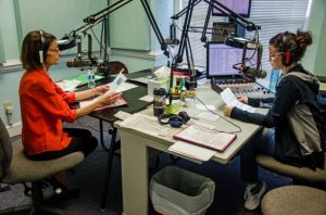 Two volunteers recording in sound studio at North Carolina Reading Service